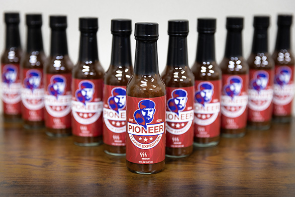 Pioneer Flavor Expedition hot sauce bottles