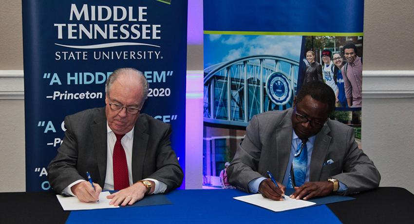 MTSU President Sidney A. McPhee and Vol State President Jerry Faulkner signed the documents