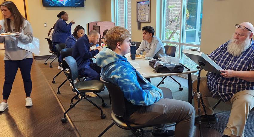 Caricature artist on the Springfield campus